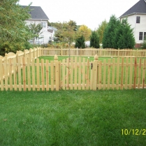 Spaced-Board-Wood-Fence-with-Convex-Top