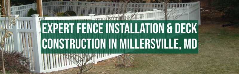 The image shows a white picket fence installed in a yard with some small plants and trees nearby. Overlaid on the fence is a large green banner with white text that reads: "EXPERT FENCE INSTALLATION & DECK CONSTRUCTION IN MILLERSVILLE, MD."