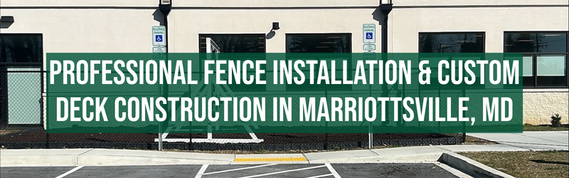 A large green banner with white text that reads, "PROFESSIONAL FENCE INSTALLATION & CUSTOM DECK CONSTRUCTION IN MARRIOTTSVILLE, MD," displayed in front of a building with multiple windows and handicap parking signs.